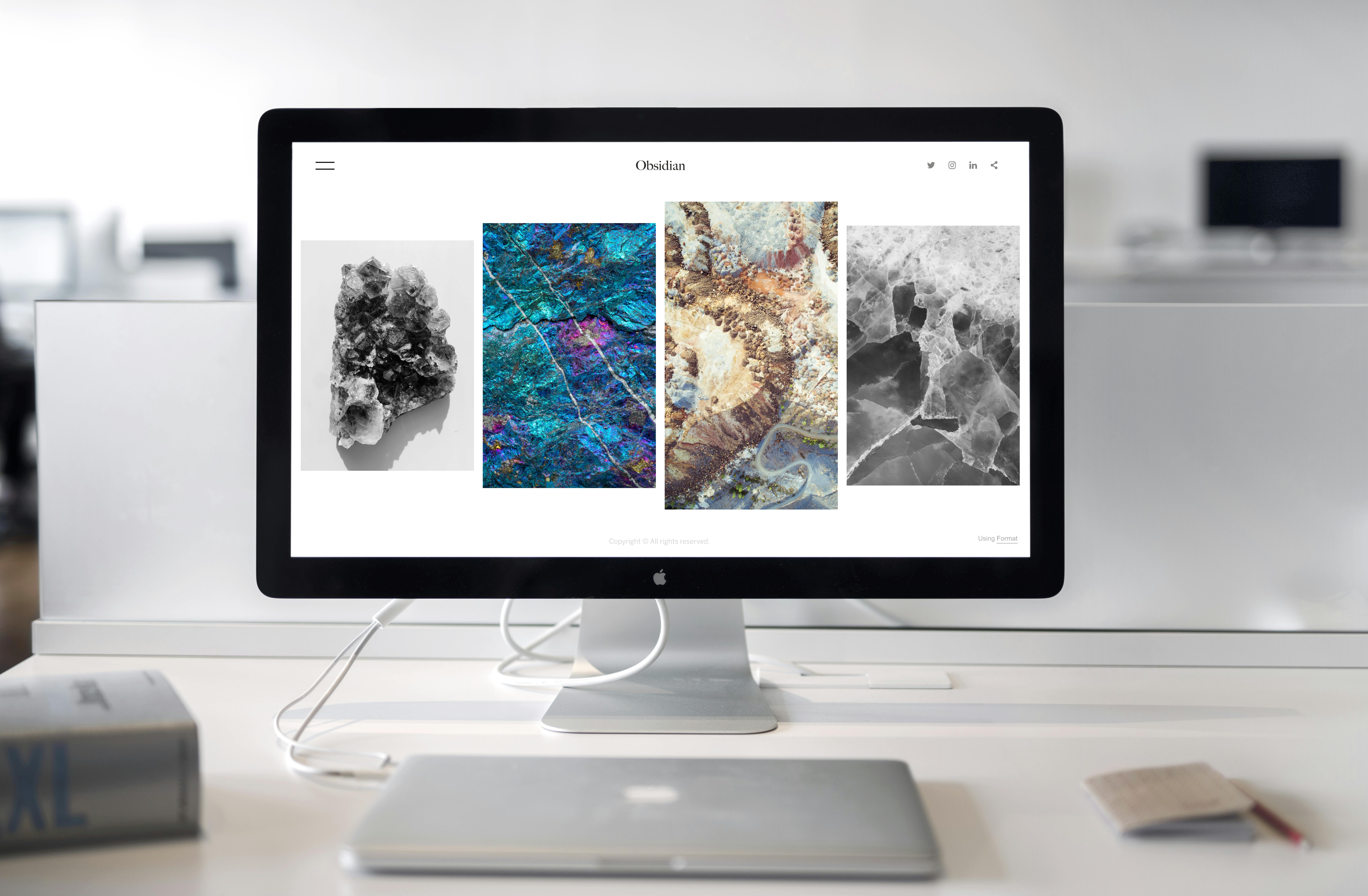 computer screen with images of landscapes